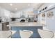 Modern kitchen with stainless steel appliances and granite countertops at 8711 Betty St, Port Richey, FL 34668