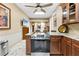 Modern kitchen with stainless steel appliances and granite counters at 8711 Betty St, Port Richey, FL 34668