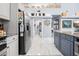 Kitchen with stainless steel appliances and granite countertops at 8711 Betty St, Port Richey, FL 34668