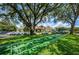 Shuffleboard court with clubhouse in background at 9309 Clearmeadow Ln, New Port Richey, FL 34655