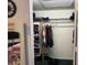 Walk-in closet with shelving and hanging rods at 9741 Star Trl, New Port Richey, FL 34654