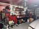 Well-equipped workshop area in garage at 9741 Star Trl, New Port Richey, FL 34654