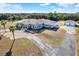 Aerial view of house and surrounding area at 10030 Orchard Way, Spring Hill, FL 34608