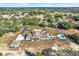 Wide aerial view of property, including pool at 10030 Orchard Way, Spring Hill, FL 34608
