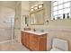 Clean bathroom with a walk-in shower and updated vanity at 10030 Orchard Way, Spring Hill, FL 34608
