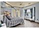 Bright bedroom showcasing a comfortable bed and ample natural light at 10030 Orchard Way, Spring Hill, FL 34608