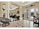 Elegant entryway with tile flooring, high ceilings, and a view into the living room at 10030 Orchard Way, Spring Hill, FL 34608