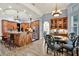 Large kitchen with island, breakfast nook, and stainless steel appliances at 10030 Orchard Way, Spring Hill, FL 34608