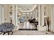 Open living room with high ceilings and recessed lighting at 10030 Orchard Way, Spring Hill, FL 34608
