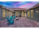 Spacious patio with seating area and outdoor kitchen at 10030 Orchard Way, Spring Hill, FL 34608