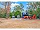 Spacious RV parking with room for vehicles and equipment at 10030 Orchard Way, Spring Hill, FL 34608