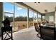 Enjoyable screened porch with outdoor seating and grill at 10030 Orchard Way, Spring Hill, FL 34608
