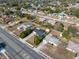 This aerial view captures the home's setting in a neighborhood convenient to shopping and thoroughfares at 10147 Spring Hill Dr, Spring Hill, FL 34608
