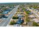 Wide aerial shot displays the community, showcasing home's proximity to a convenient roadway at 10147 Spring Hill Dr, Spring Hill, FL 34608