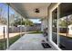 Covered patio with concrete floor and sliding door at 10147 Spring Hill Dr, Spring Hill, FL 34608