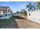 Large backyard with shed and play area at 10147 Spring Hill Dr, Spring Hill, FL 34608
