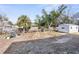 Large backyard with playset and soccer goals at 10147 Spring Hill Dr, Spring Hill, FL 34608