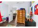 bedroom with wood dresser and toys at 10147 Spring Hill Dr, Spring Hill, FL 34608
