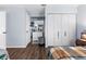 Bedroom with light gray walls and white closet doors at 10147 Spring Hill Dr, Spring Hill, FL 34608