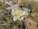 Aerial view of the home showcasing its size and landscaping at 106 Banana St, Tarpon Springs, FL 34689