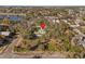Wide aerial view showing home's location in a residential area at 106 Banana St, Tarpon Springs, FL 34689