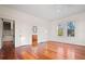 Bright bedroom with hardwood floors and ample natural light at 106 Banana St, Tarpon Springs, FL 34689