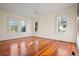 Bright bedroom with hardwood floors and large windows at 106 Banana St, Tarpon Springs, FL 34689