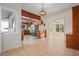 Bright kitchen features stainless steel appliances and wood cabinets at 106 Banana St, Tarpon Springs, FL 34689