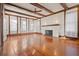 Spacious living room with hardwood floors, fireplace and high ceilings at 106 Banana St, Tarpon Springs, FL 34689