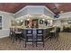 Well-appointed bar area with counter seating and pendant lighting at 1082 Dartford Dr, Tarpon Springs, FL 34688