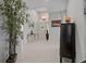 Bright foyer featuring tile floors, arched doorway, and elegant decor at 1082 Dartford Dr, Tarpon Springs, FL 34688