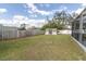 Backyard features a fence and an outbuilding for storage at 11731 Linden Dr, Spring Hill, FL 34608
