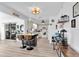 Bright kitchen with an eat-in island, lots of storage, and stainless steel appliances at 11731 Linden Dr, Spring Hill, FL 34608