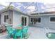 Enclosed pool area featuring seating and sliding glass door at 11731 Linden Dr, Spring Hill, FL 34608