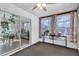 Bright Florida room featuring ceiling fan, carpeted floor and sliding glass doors at 11731 Linden Dr, Spring Hill, FL 34608