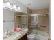 Bathroom with tub, shower, granite countertop at 11830 Wax Myrtle Ct, New Port Richey, FL 34654