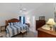 Main bedroom with king-size bed and plenty of dresser space at 11830 Wax Myrtle Ct, New Port Richey, FL 34654