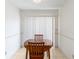 Small dining area with round table and chairs, near sliding door at 11830 Wax Myrtle Ct, New Port Richey, FL 34654