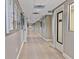 Community building hallway with access to various rooms at 11830 Wax Myrtle Ct, New Port Richey, FL 34654