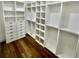 Spacious walk-in closet with custom built-in shelving and drawers at 12102 Chapman Ave, Port Charlotte, FL 33953