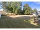 Spacious backyard with mature trees at 13429 Lawrence St, Spring Hill, FL 34609