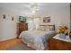 Bright bedroom with a double bed and wood flooring at 13429 Lawrence St, Spring Hill, FL 34609