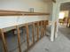 A damaged bathroom with exposed plumbing and framing needing repair at 13737 Michelle Ave, Hudson, FL 34667