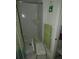 Small shower with a shower chair at 13737 Michelle Ave, Hudson, FL 34667