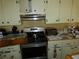 Kitchen with stainless steel appliances and ample cabinetry at 13737 Michelle Ave, Hudson, FL 34667