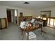 A living room in need of complete renovation, showing significant water damage at 13737 Michelle Ave, Hudson, FL 34667