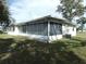 Large screened porch offers additional outdoor space at 13737 Michelle Ave, Hudson, FL 34667