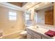 Clean bathroom with bathtub, shower, and updated vanity at 1378 Haulover Ave, Spring Hill, FL 34608