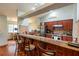 Modern kitchen with granite countertops and breakfast bar at 1378 Haulover Ave, Spring Hill, FL 34608