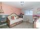 Charming bedroom with daybed and decorative accents at 14004 Cascade Ln, Tampa, FL 33618